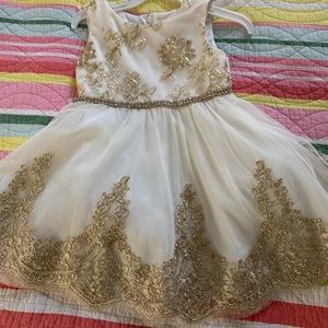 Ivory and gold dress. Worn for a few hours. Gold bling trim.